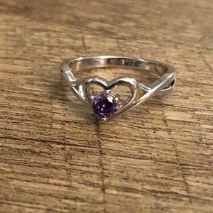 Heart ring with purple stone